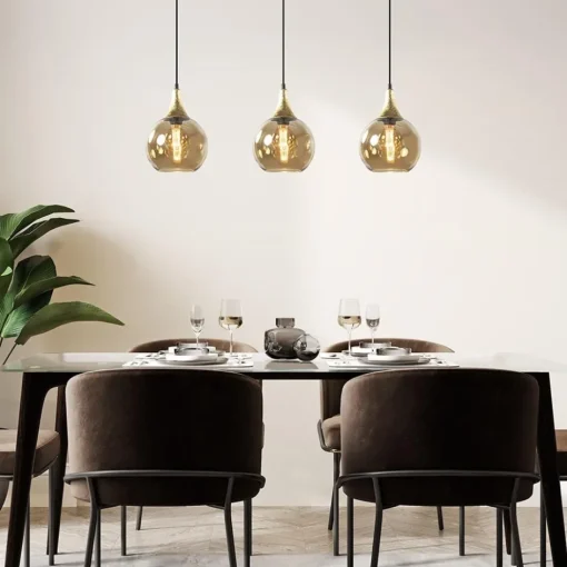 Chique 3-lichts hanglamp zwart/goud met amber glas>Straluma Best
