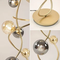 Chique vloerlamp goud met smoke en amber glazen bollen></noscript>Straluma