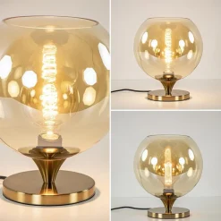 Elegante tafellamp donker goud met amber glazen bol 25 cm></noscript>Straluma