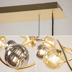Grote hanglamp goud met amber/smoke glazen bollen></noscript>Straluma