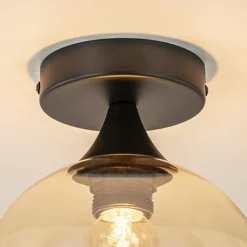 Kleine plafondlamp zwart met amber glazen bol></noscript>Straluma Best