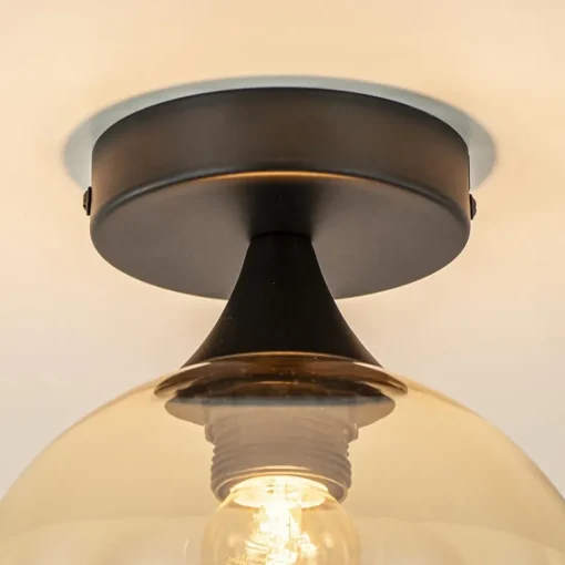 Kleine plafondlamp zwart met amber glazen bol>Straluma Best