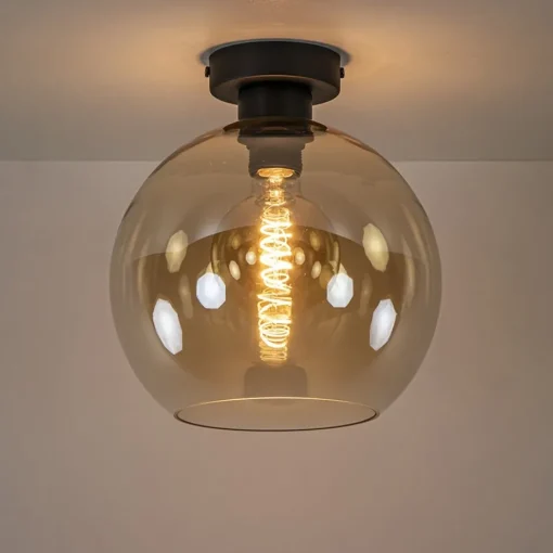 Mat zwarte plafondlamp met amber glazen bol>Straluma Online