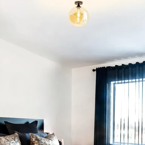 Mat zwarte plafondlamp met amber glazen bol 30 cm>Straluma Best