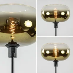 Mat zwarte vloerlamp met glazen kap helder/goud></noscript>Straluma